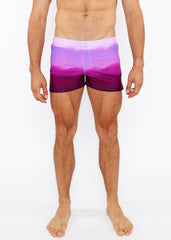 Gradient printed swim short featuring purple gradient swim trunks with a soft fade from lavender to deep violet hem