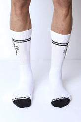 Starter crew socks white cotton crew socks with black toe caps and two horizontal stripes near the top