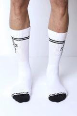 Starter crew socks white cotton crew socks with black toe caps and two horizontal stripes near the top