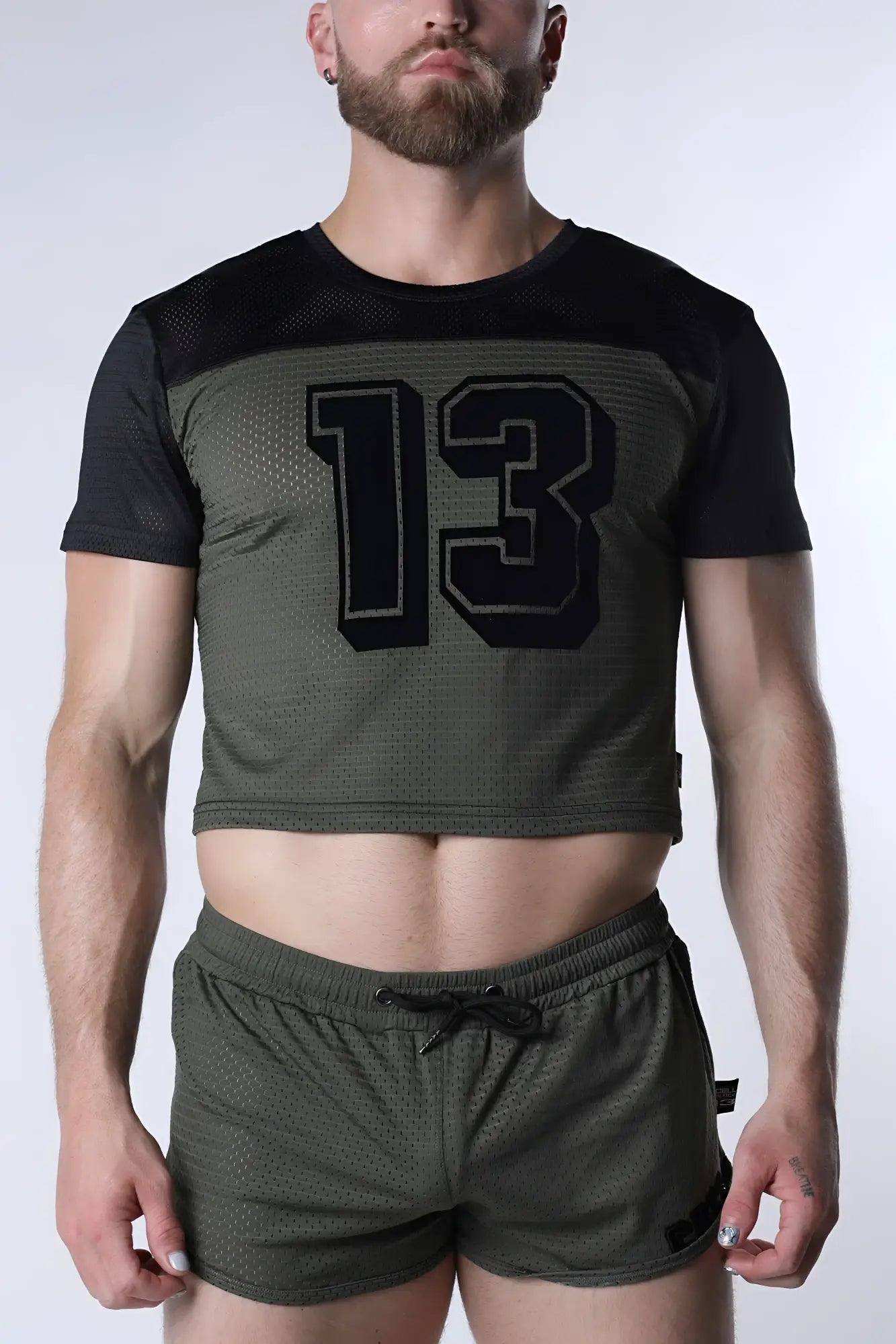 Starter mesh crop top in olive green with black short sleeves and a bold 13 graphic on the chest