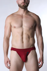 Starter mesh jockstrap in red mesh briefs with a black logo on the side for breathable support