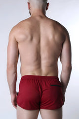 Starter mesh short red athletic shorts with mesh texture and black trim on side pockets