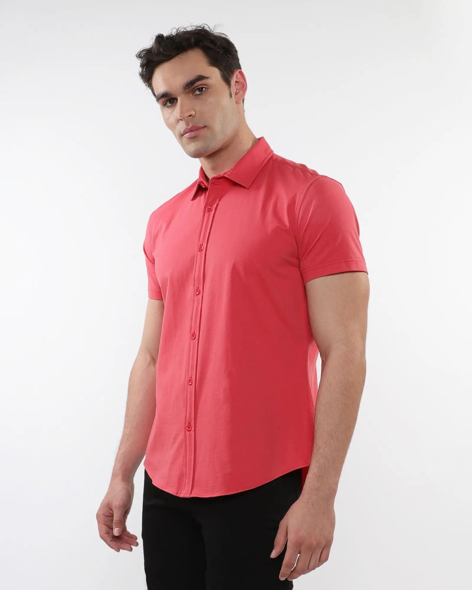 A vibrant coral stretch knit shirt with short sleeves, button-up front, classic collar, and tailored fit