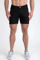 Black stretch knit shorts featuring a classic five-pocket design and single white button closure