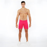 Bright pink stretch knit shorts with classic five-pocket design and button closure for comfortable wear