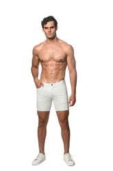 White stretch knit short denim shorts with classic five-pocket design and button closure front view