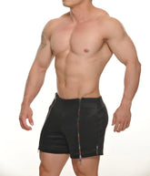 Black leather tyler zipper shorts featuring a rainbow-colored zipper down the front for a bold look