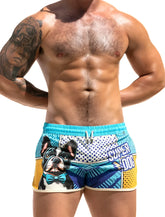 Super dog swim short bright turquoise and yellow swim trunks with cartoon french bulldog and bold blue super dog text
