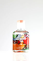 A clear plastic bottle of superslyde lube super slick silicone lubricant with a colorful cartoon-style label