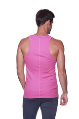 A vibrant berry pink sleeveless sustain tank with smooth stretchy fabric and a central back seam shown from the back