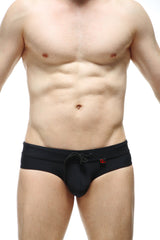 PetitQ swim bikini Ajoupa black swim trunks with drawstring waistband and small red logo on the side
