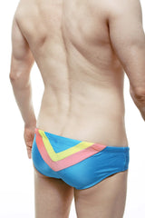 Bright blue swim brief with bold yellow and pink v-shaped chevron pattern ideal for swimming and beachwear