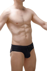 Black swim brief mimet recycled with drawstring waistband and a small red logo on the side