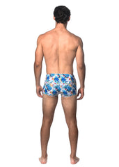 Blue and white floral patterned tropics printed swim trunk designed for comfortable beach and pool use