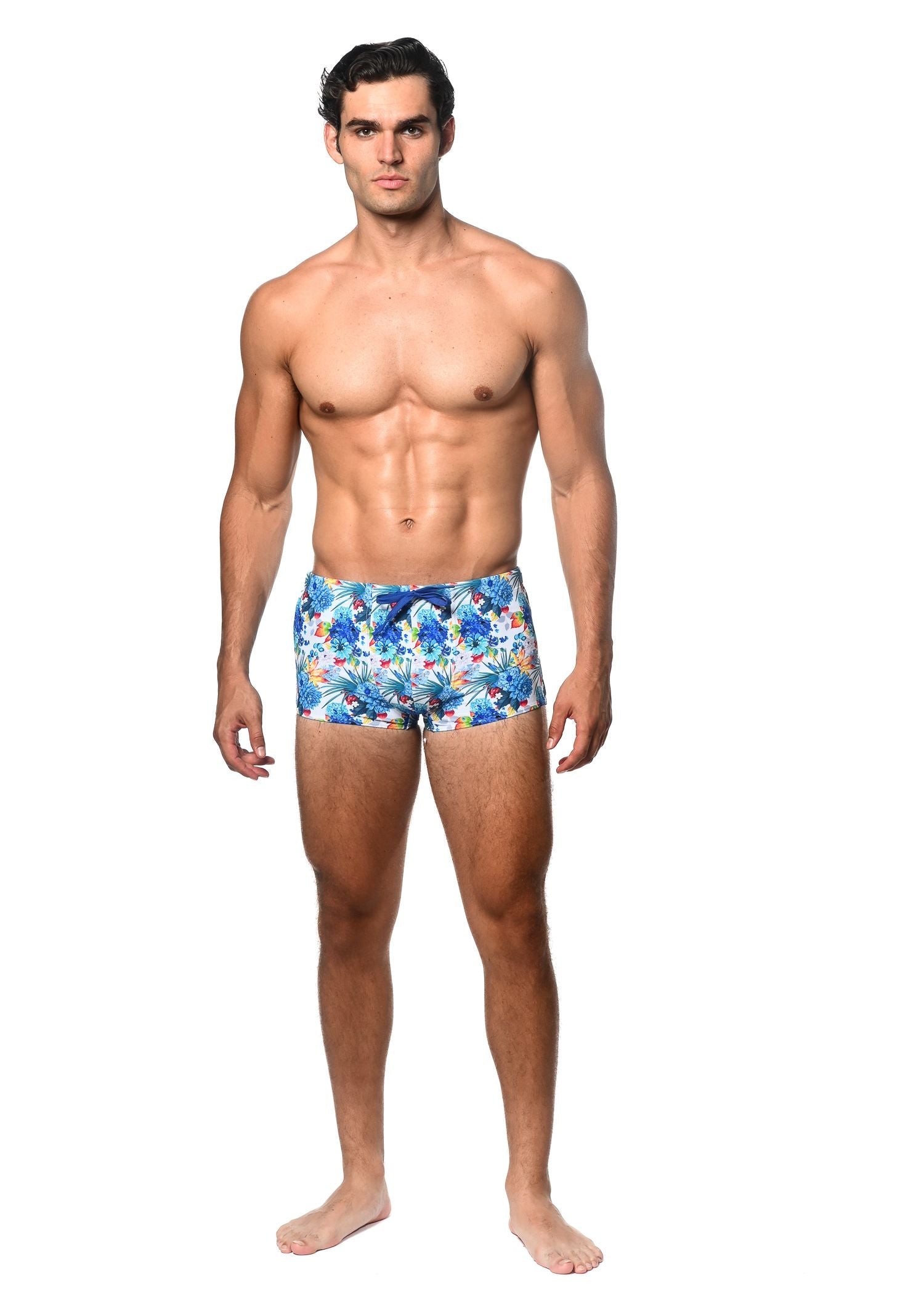 Tropics printed swim trunk in blue and white tropical print with matching blue drawstring for beachwear