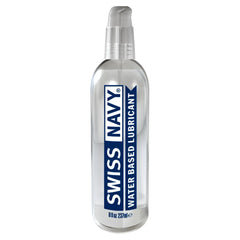 Clear plastic bottle with silver pump dispenser labeled swiss navy water-based water lubricant in blue and white text