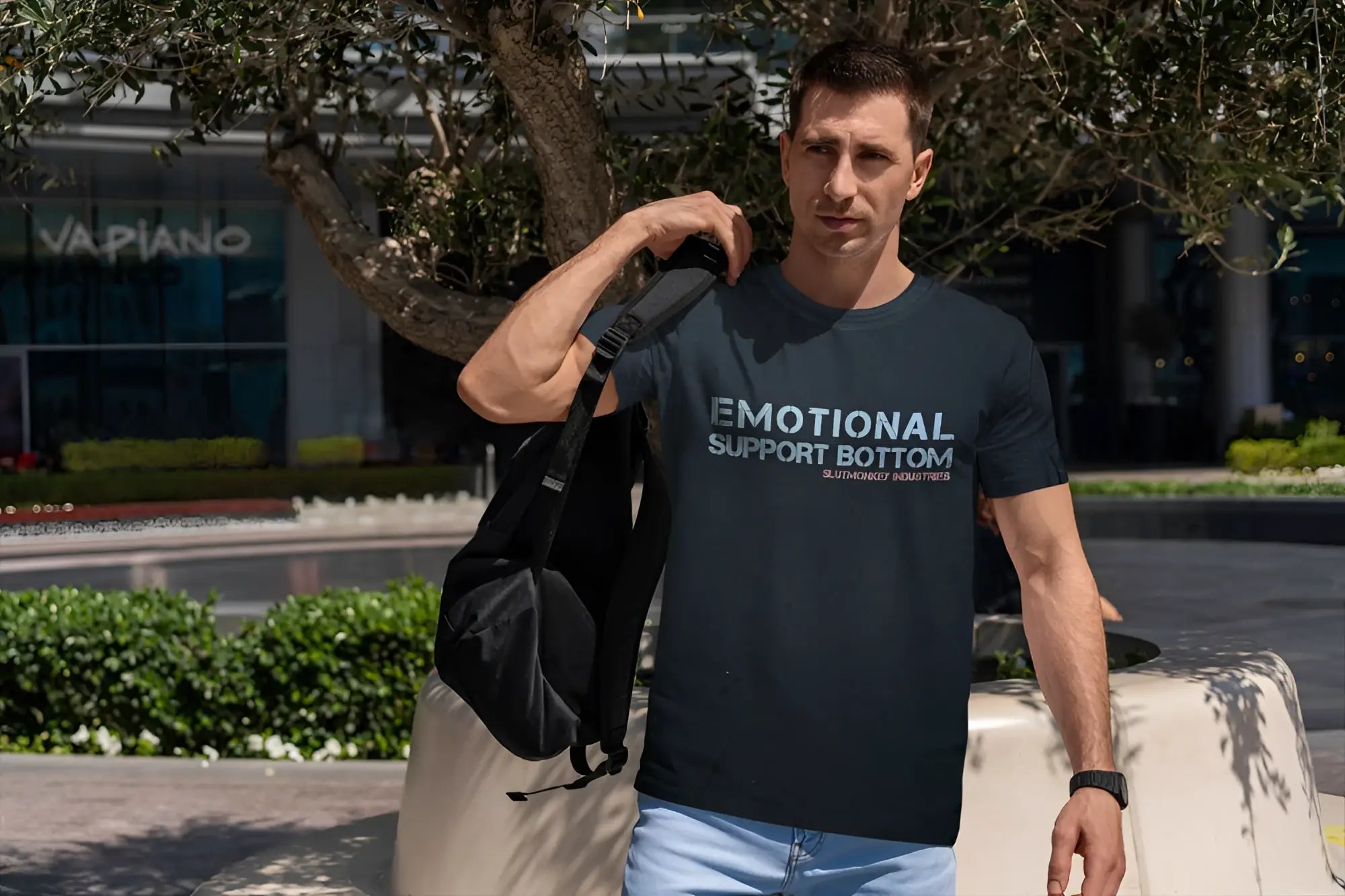 Dark navy blue short-sleeved cotton t-shirt with white emotional support bottom text and smaller red text below