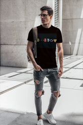 Black short-sleeved cotton t-shirt by t-shirt monkey with colorful classic video game character graphics