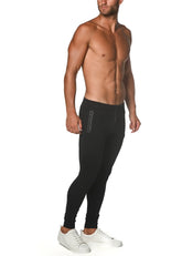 Black tactical gym-tech stretch slim joggers with a sleek fit and subtle side zipper pockets for athletic use