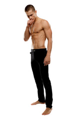 Black slim-fit tactical urban dress pant with sleek modern design and subtle button detailing at waistband