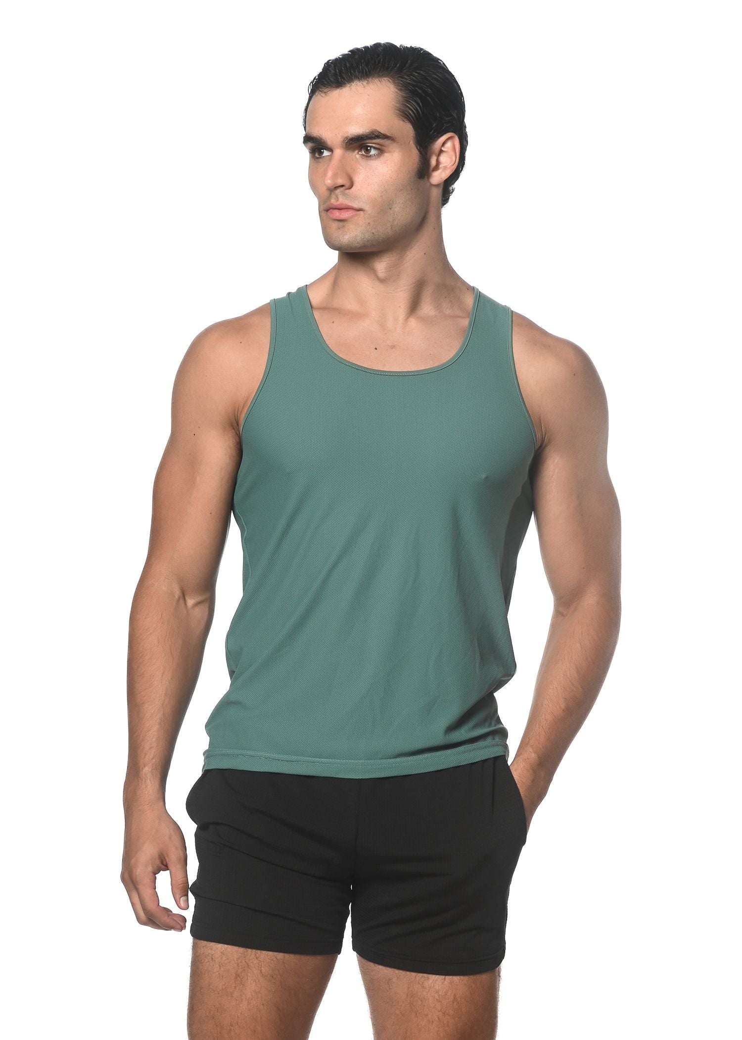 A sleek solid teal textured mesh performance tank with sleeveless design and rounded neckline for activewear