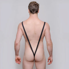 Black mesh strappy backless briefs showing the back of the Tartarus sling shot body thong with rings
