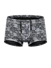 Black and white floral patterned tartarus swim trunk with drawstring waistband for comfortable beachwear