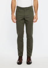 Olive green slim-fit chino pants with textured stretch woven fabric and five-pocket design for versatile wear