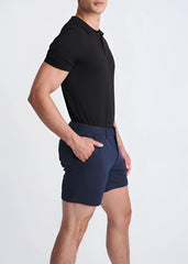 Navy blue textured stretch knit chino shorts with a modern cut and subtle side pockets for casual wear