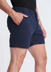Navy blue textured stretch knit chino shorts with tailored fit and subtle side seam detailing for a modern look