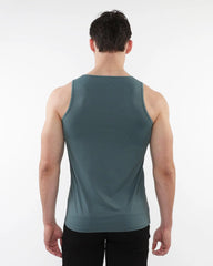 A sleek dark teal sleeveless tank top made of textured stretch mesh performance fabric with a smooth fit