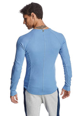 Thermal v-neck long sleeve shirt in ice blue showing back with ribbed fabric central seam and subtle side panels