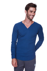 A men’s royal blue thermal v-neck long sleeve henley shirt made from soft stretchy knit fabric
