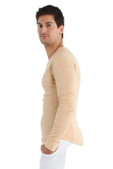 Beige thermal v-neck long sleeve shirt with a fitted tapered silhouette in sand color, front view