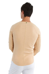 Beige thermal v neck long sleeve fitted shirt with subtle ribbed texture and central seam on back side