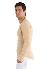 Beige thermal v-neck long sleeve shirt with a fitted tapered silhouette in sand color, front view