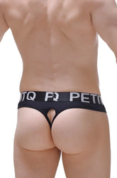 Black thong auzis with wide waistband featuring white petitq lettering shown from the back side