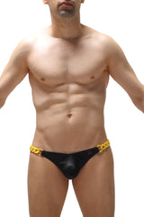 Black leather briefs with bold yellow chain detailing at the waistband shown from the back for a thong chains satin black design