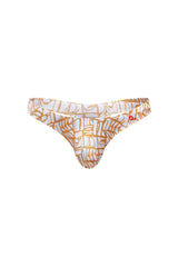 PetitQ thong chill carlot alloy white and gold patterned thong with bold abstract geometric design front view