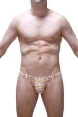 A man wearing white and gold patterned petitq thong chill carlot alloy briefs with an abstract geometric design