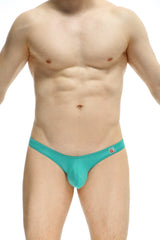 Teal form-fitting men’s briefs with smooth fabric and a small logo on the waistband from thong dome plum green collection