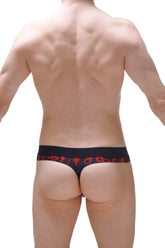 Black thong with red symbolic patterns along the waistband featuring a thong hole cockring for boudoir use back view