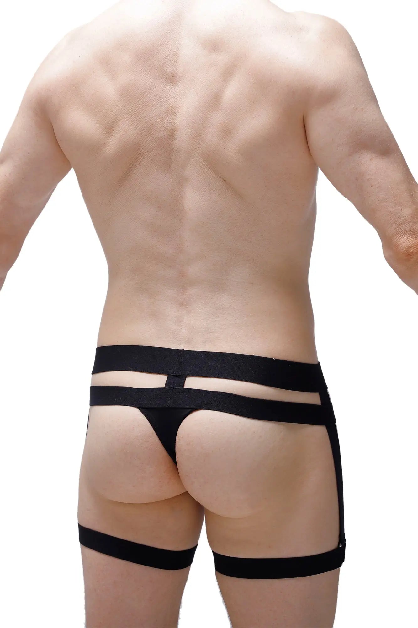 Black harness-style thong maizey briefs by petitq featuring multiple straps for a bold modern design