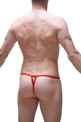 Red thong with a thin form-fitting design made of lace shown from the back in the thong migny lace red product image