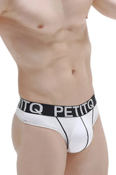 White petitq modal thong with pad in white featuring a black waistband with bold white brand name