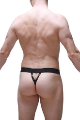 Back view of black thong with wide waistband and decorative metal rings in lace navy collection
