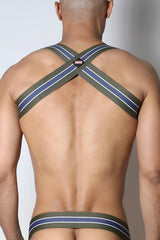 Back side of tight end elastic harness made of olive green and navy blue striped fabric with white trim and black logo patch
