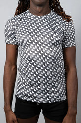 Black and white geometric patterned short sleeve rash guard tee designed for sun protection and active wear