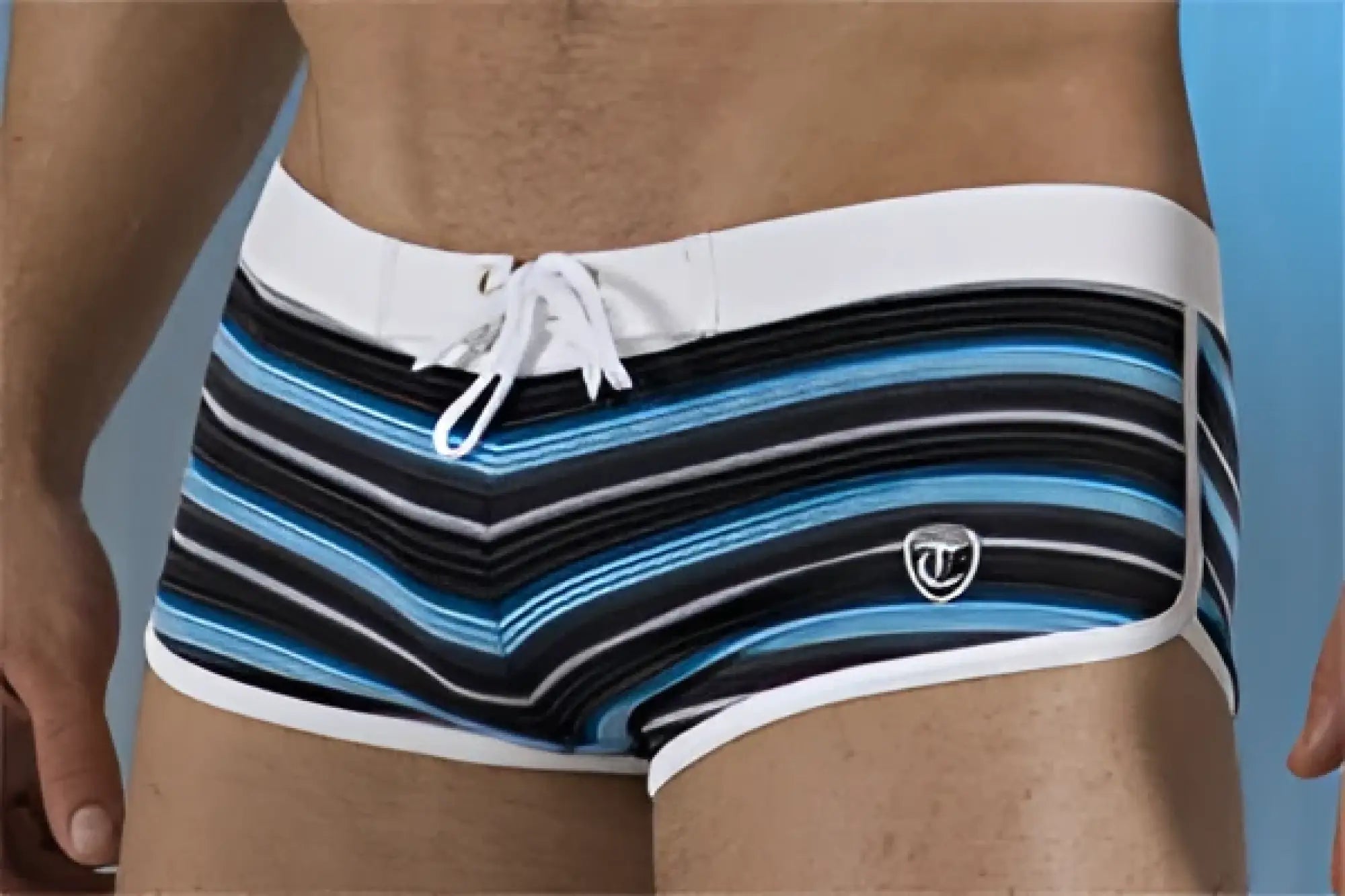 Blue and white striped Timoteo Competition trunk swimwear with a white drawstring waistband size medium