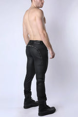 Black leather toro zipper pant showing the back with a sleek fit and distinctive silver zipper along the seam